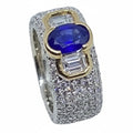 Anello Fascia con Zaffiro e diamanti tuttogiro.