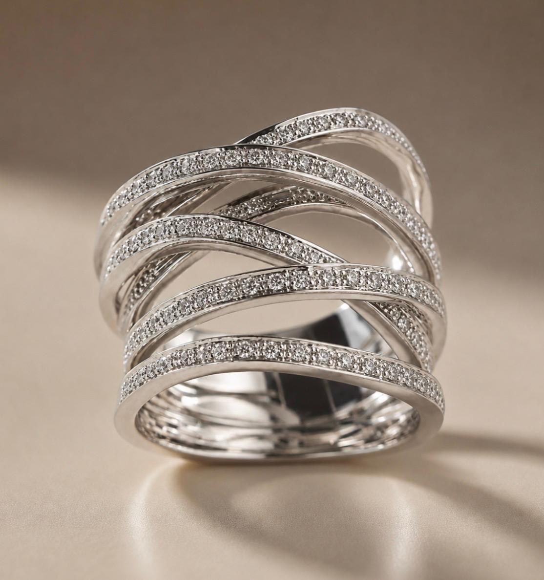 Anello "Rugiada" in oro Bianco 18K e Brillanti Bianchi.